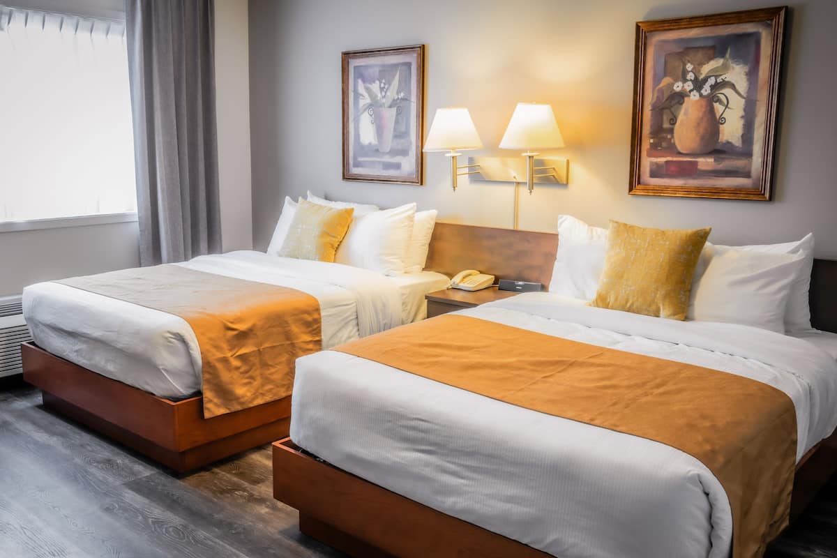 classic room, 2 double beds | 1 bedroom, pillow-top beds, desk, soundproofing