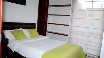 Roba de llit d'alta qualitat i caixa forta a l'habitació