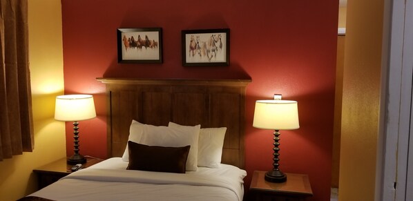 Standard Room, 2 Queen Beds street side (without AC) | Desk, soundproofing, iron/ironing board, rollaway beds