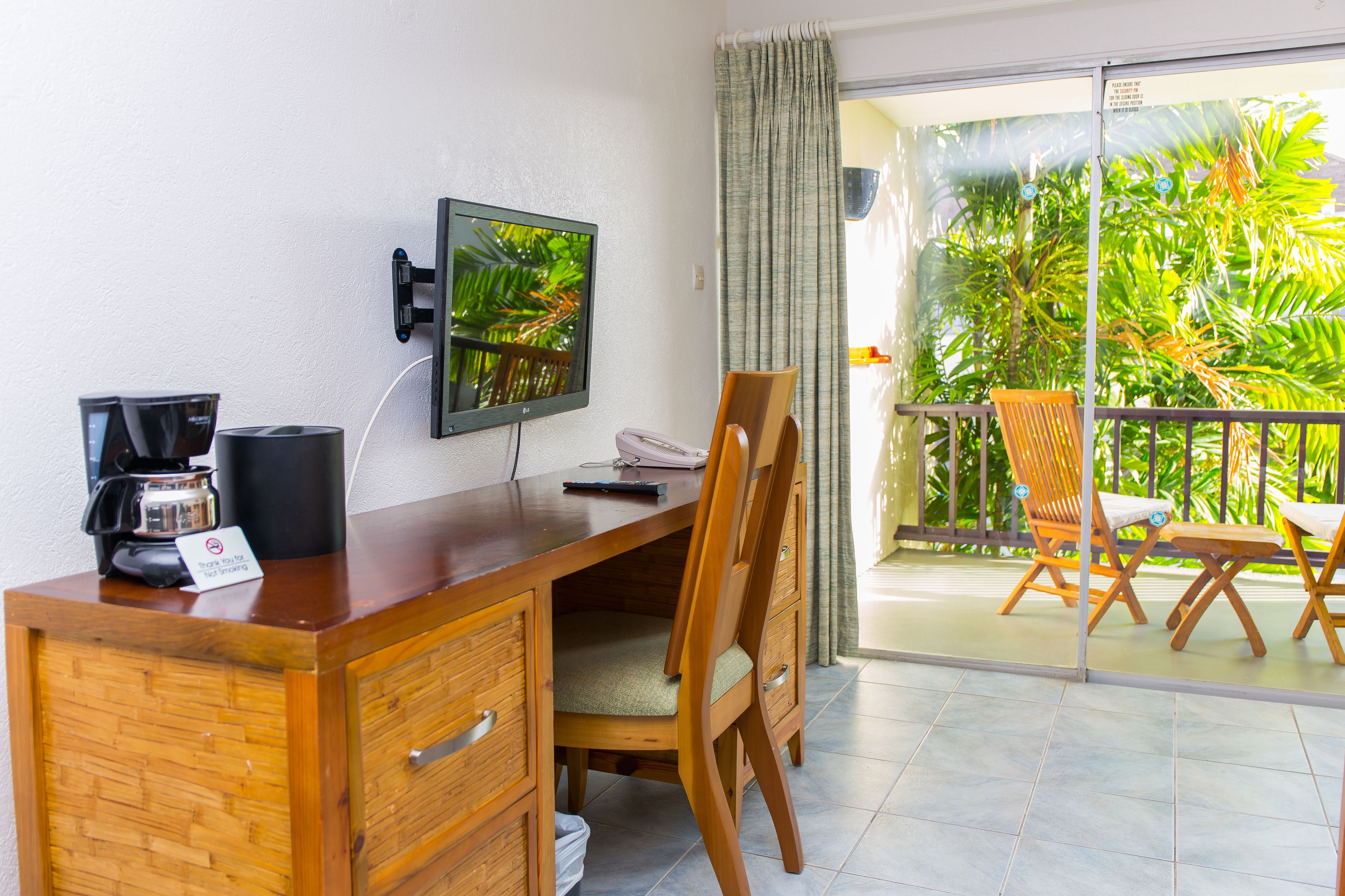 in-room safe, desk, blackout curtains, iron/ironing board