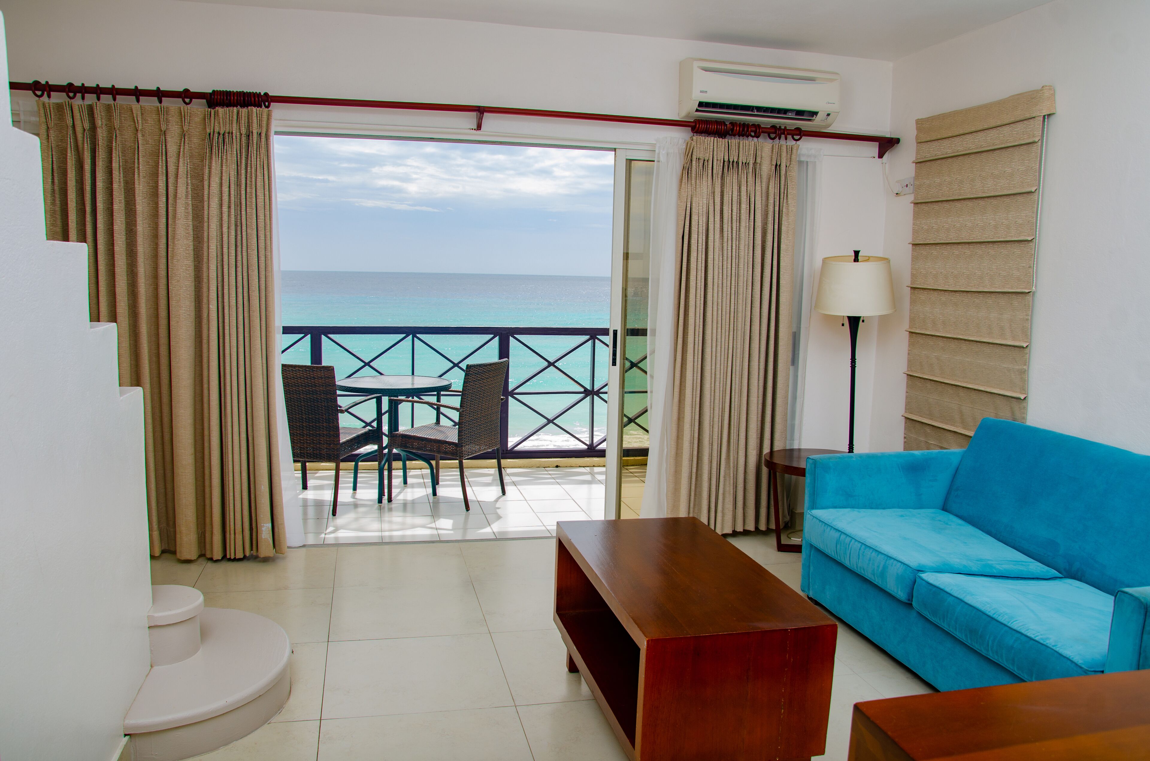 duplex penthouse suite  | living area | lcd tv