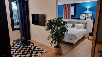 Suite Deluxe | Coffres-forts dans les chambres, bureau, chambres insonorisées