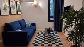 Suite – deluxe | Safe på rommet, skrivebord, lydisolert og barnesenger