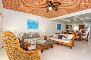 Luxury Apartment, Lagoon View | Living area | 42-inch Smart TV with digital channels - Aventuras Club (Puerto Aventuras)
