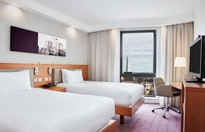 In-room safe, laptop workspace, blackout drapes, soundproofing