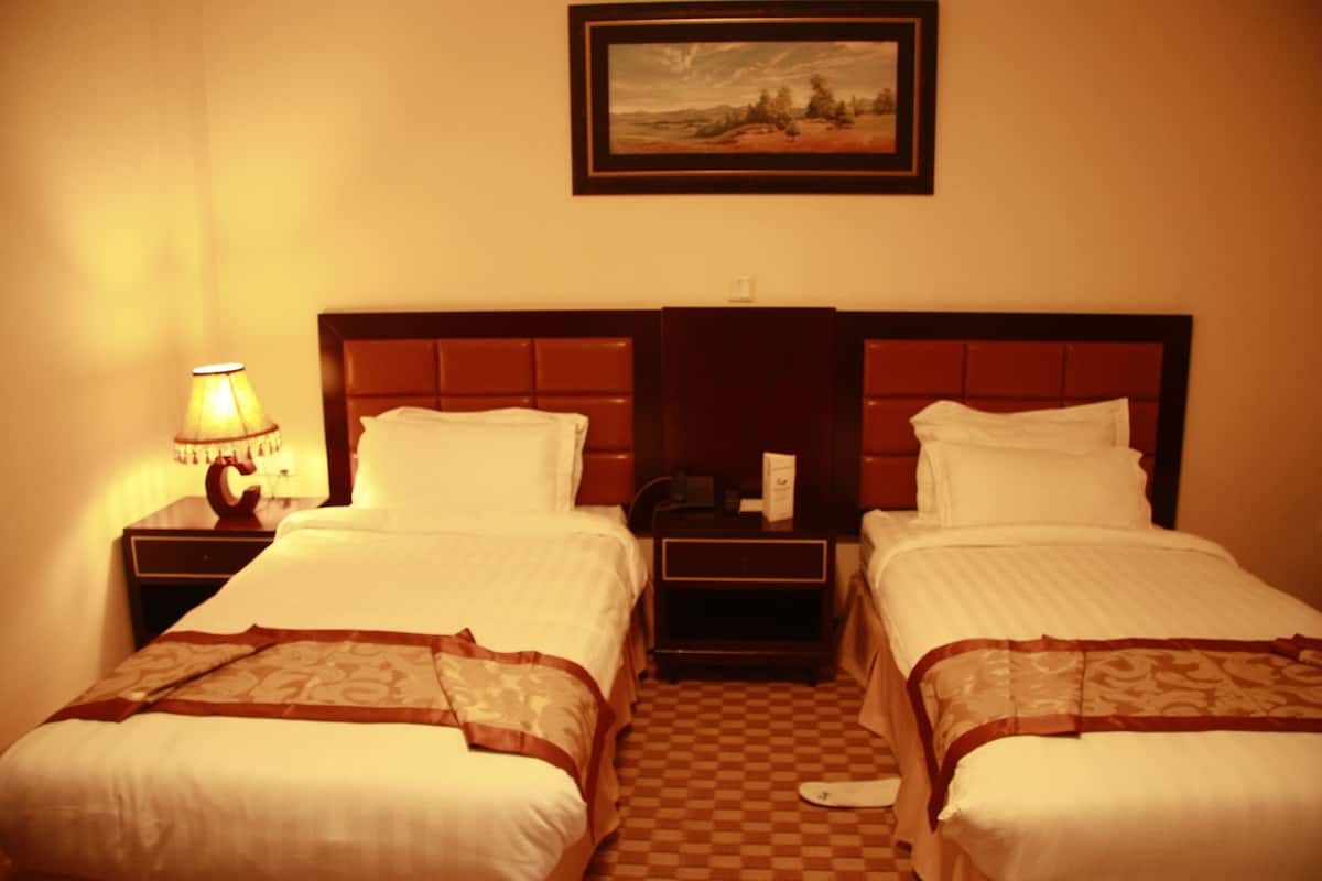 In-room safe, desk, iron/ironing board (on request), cots/infant beds