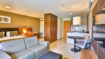 Suite, 1 King Bed, Non Smoking | Minibar, in-room safe, desk, laptop workspace