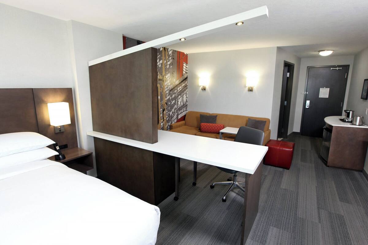 Premium bedding, down duvets, in-room safe, desk