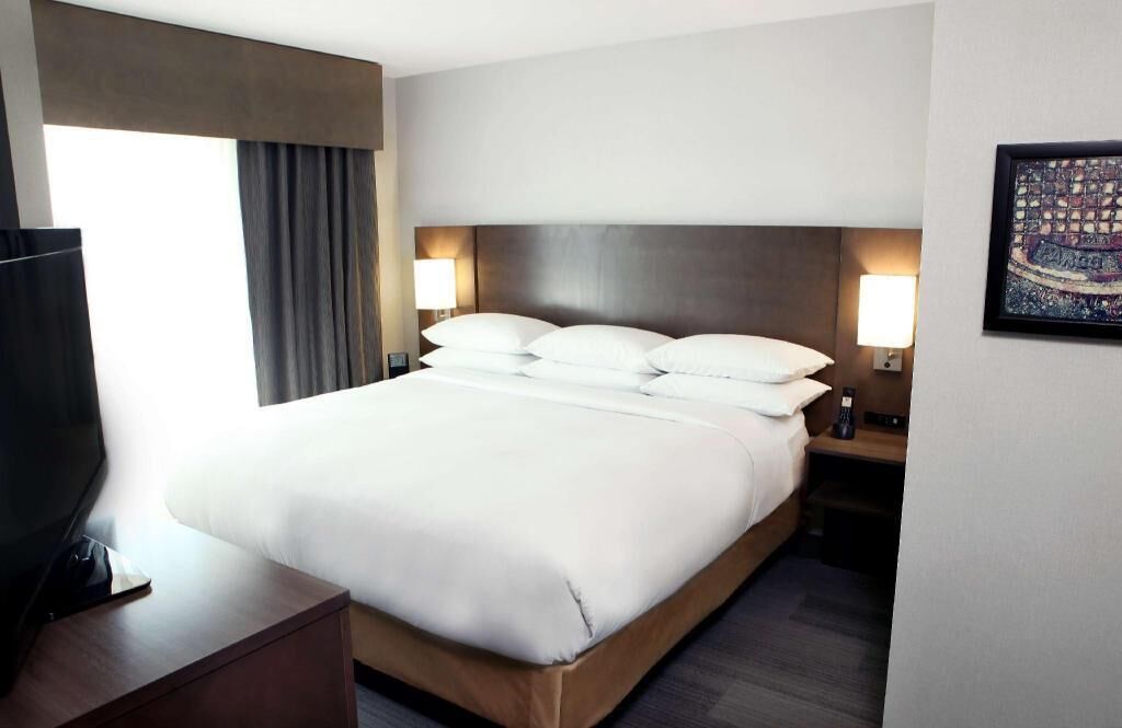 Premium bedding, down comforters, in-room safe, desk