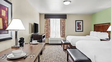 Down comforters, desk, laptop workspace, blackout drapes