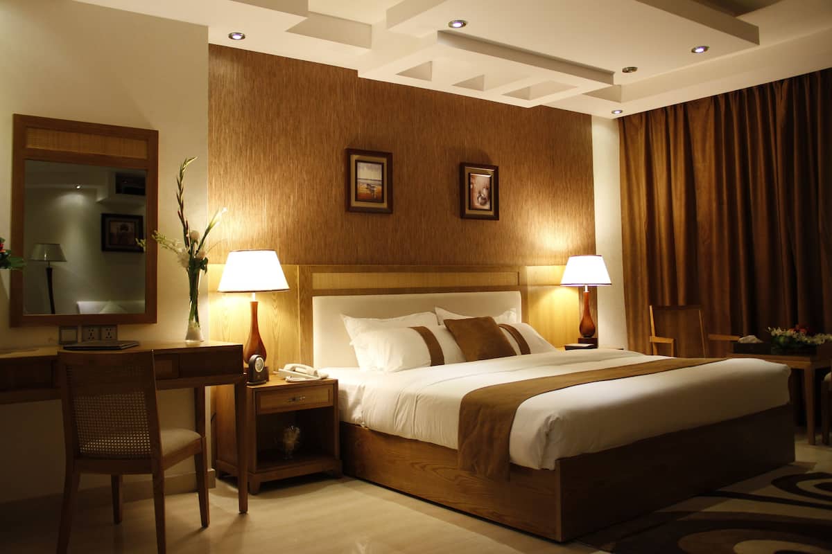 Premium bedding, down duvets, in-room safe, desk