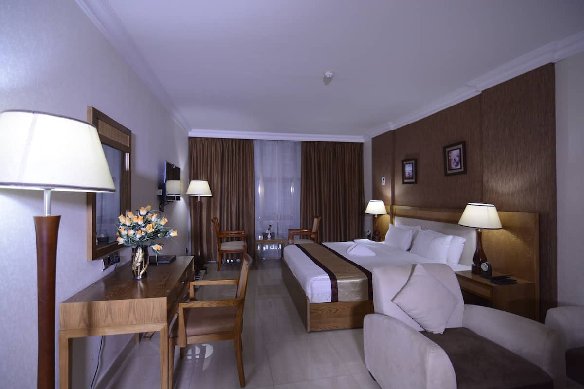Premium bedding, down duvets, in-room safe, desk