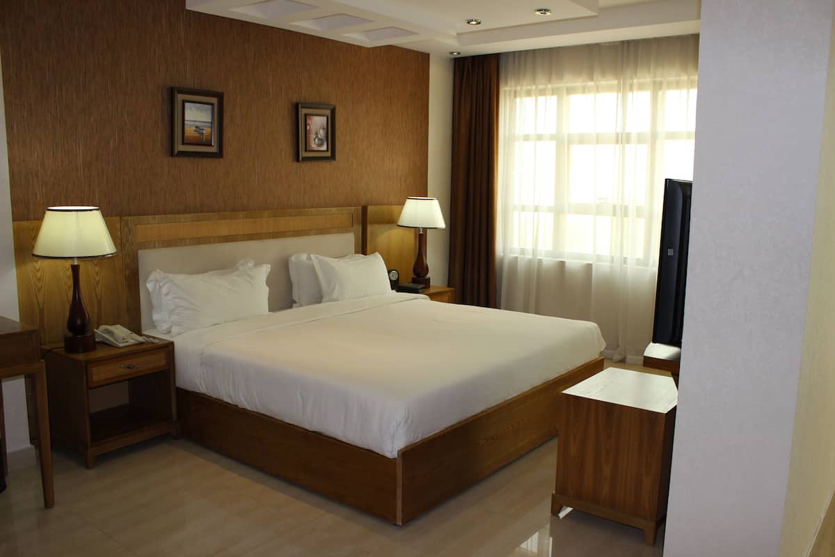 Premium bedding, down duvets, in-room safe, desk