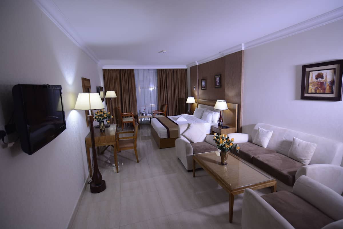 Premium bedding, down duvets, in-room safe, desk