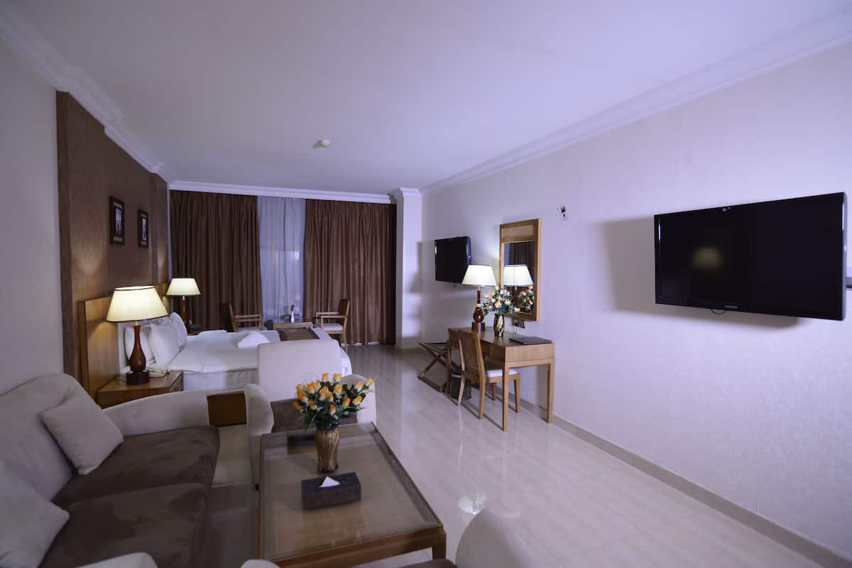 Premium bedding, down duvets, in-room safe, desk