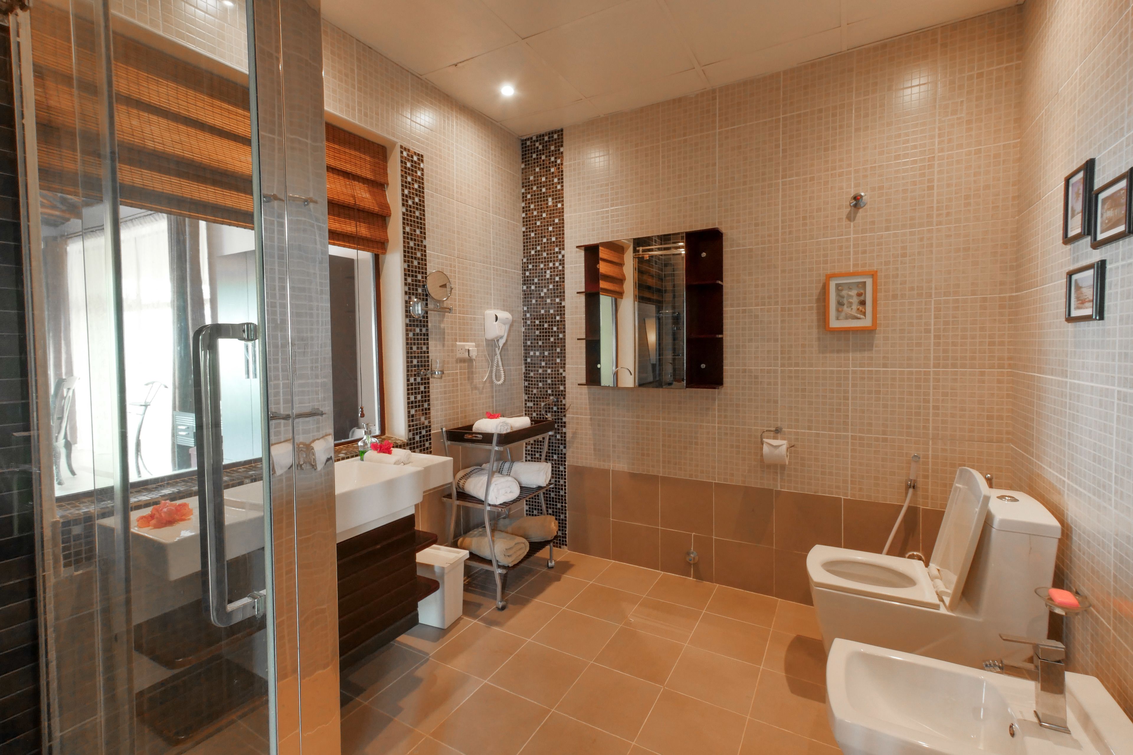 deluxe family suite ocean view  | bathroom | shower, rainfall showerhead, free toiletries, hair dryer