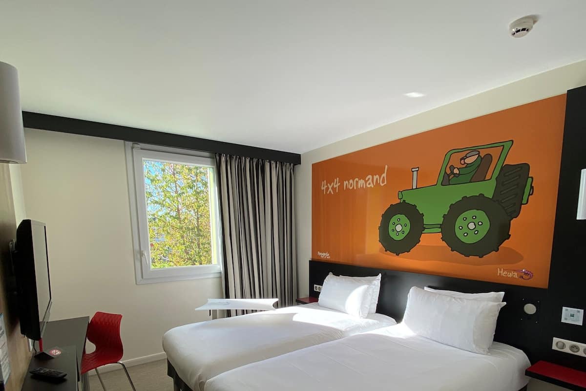 Standard Room, 2 Single Beds | Pillow-top beds, individually decorated, desk, laptop workspace