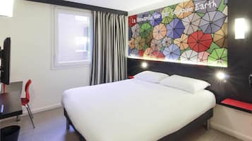 Pillowtop beds, individually decorated, desk, laptop workspace
