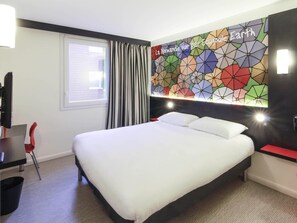 Pillowtop beds, individually decorated, desk, laptop workspace