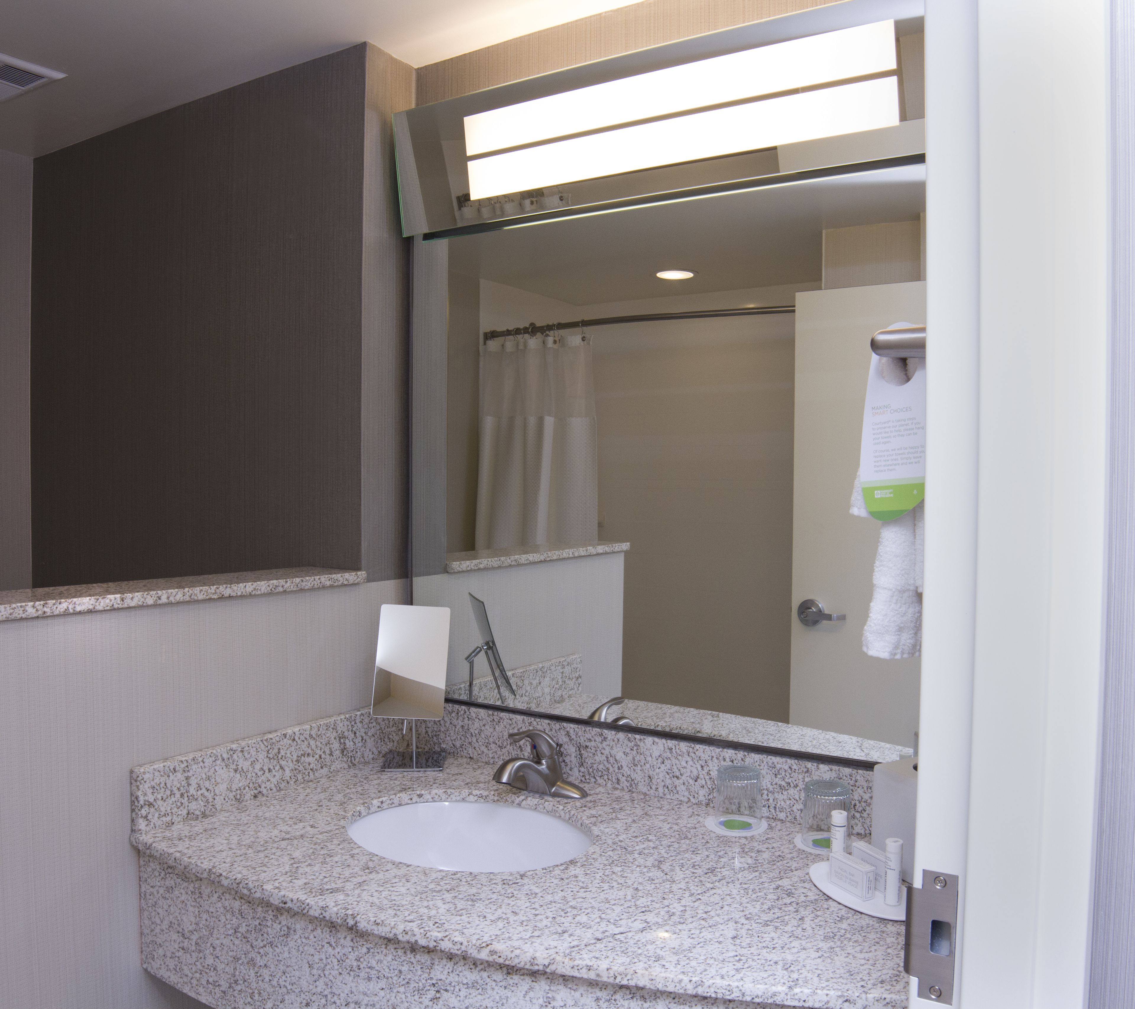 room, 2 queen beds | bathroom | shower, rainfall showerhead, free toiletries, hair dryer