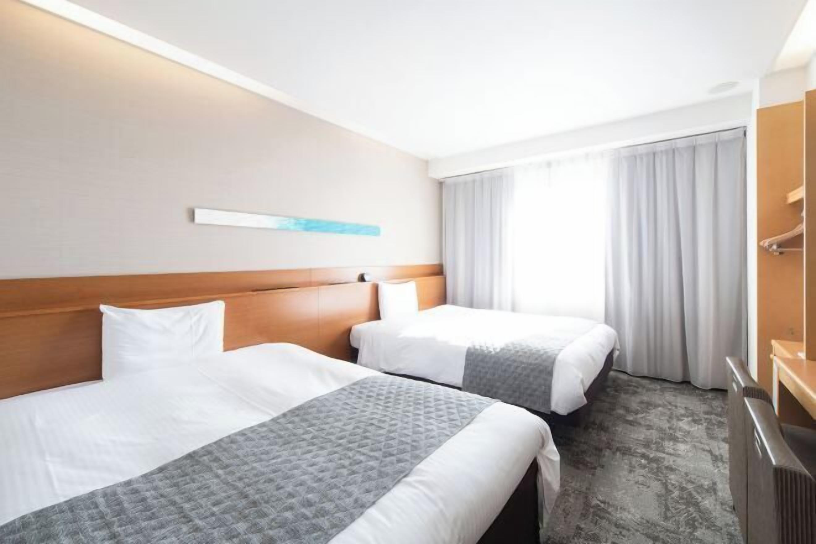 Down comforters, desk, laptop workspace, blackout drapes