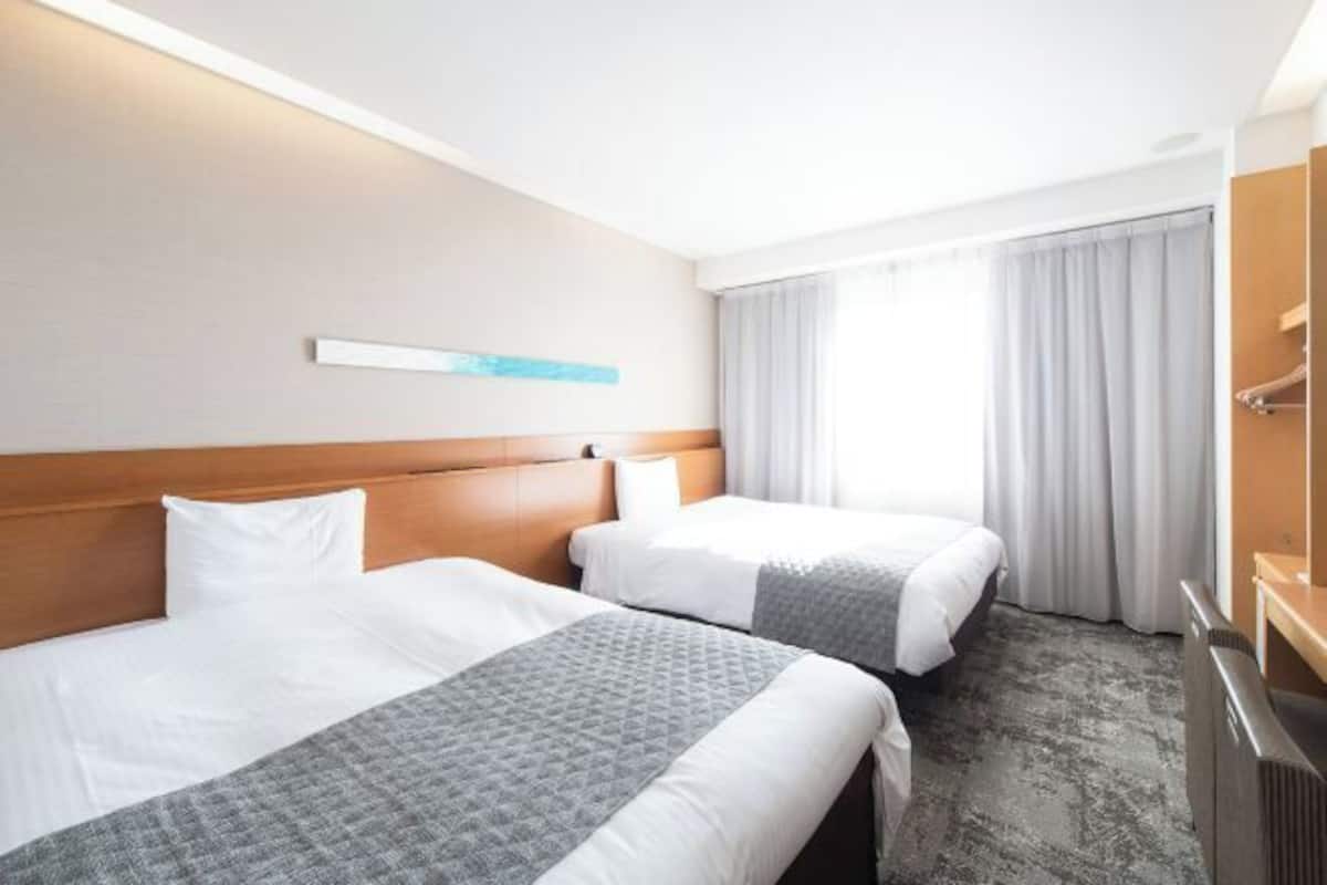 Couette en duvet, bureau, espace de travail pour ordinateurs portables