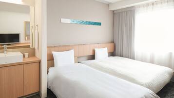 Down comforters, desk, laptop workspace, blackout drapes