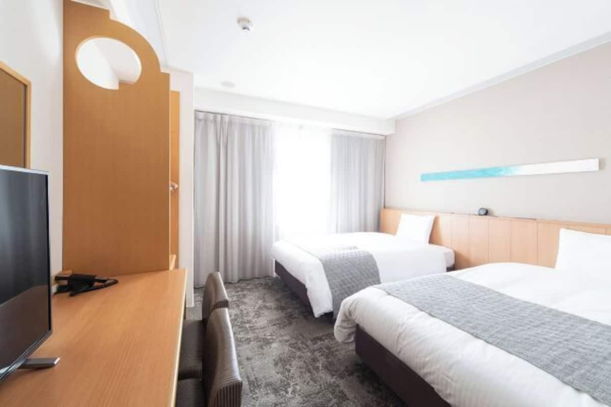 Couette en duvet, bureau, espace de travail pour ordinateurs portables