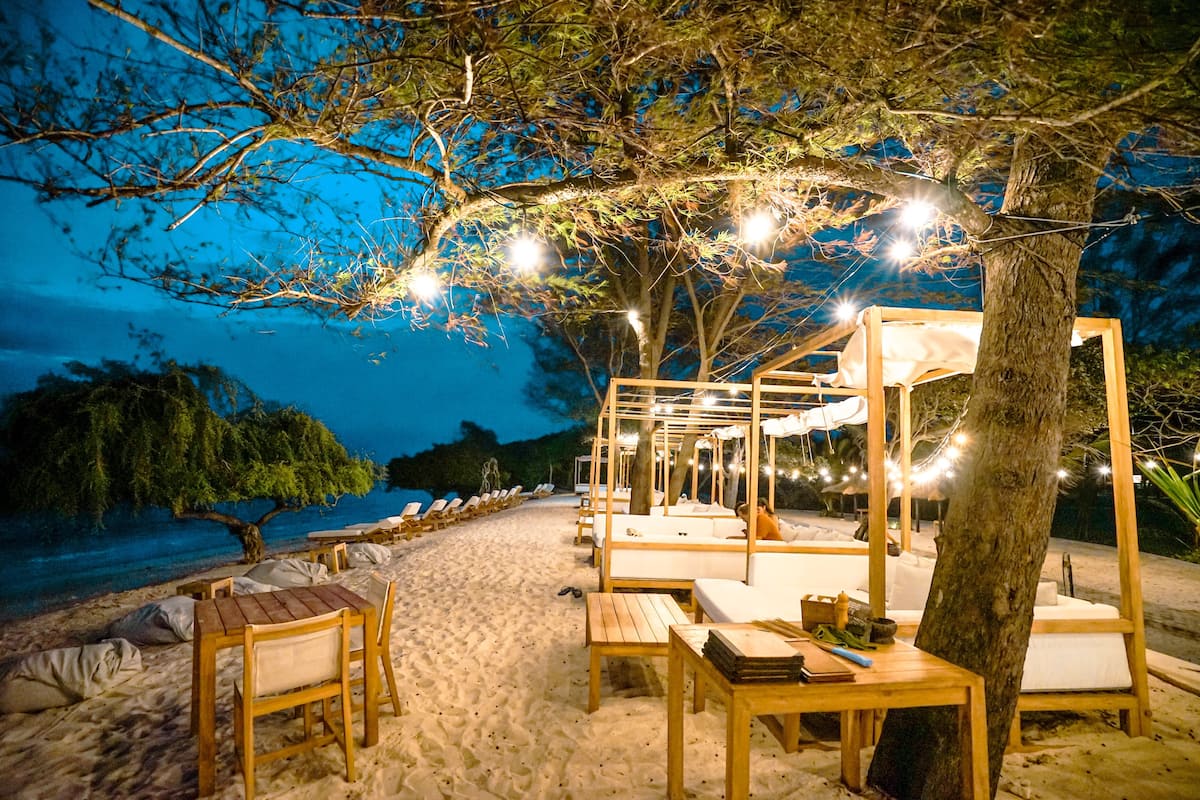 private beach, white sand, beach cabanas, sun-loungers