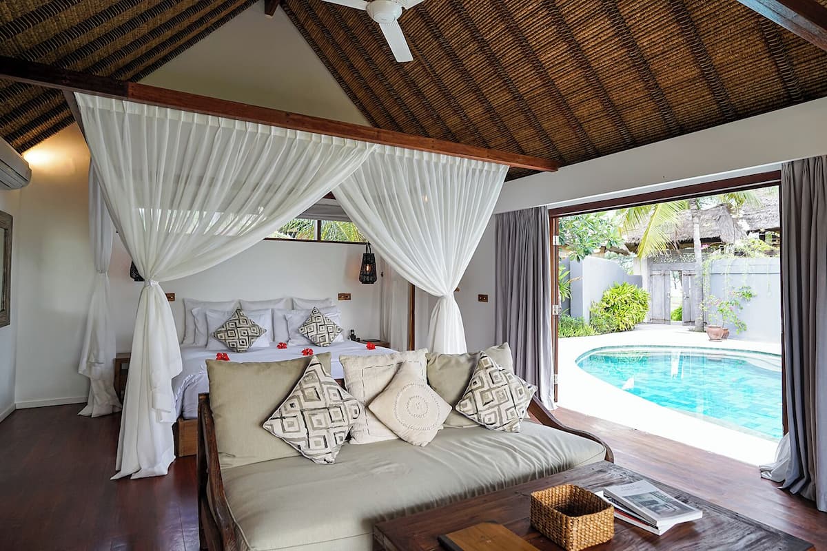 Deluxe Private Pool Villa | Premium bedding, minibar, in-room safe, individually decorated