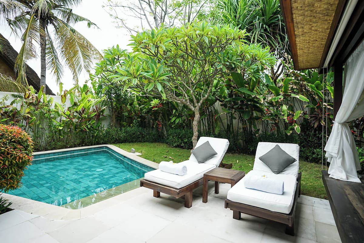 Deluxe Private Pool Villa | Premium bedding, minibar, in-room safe, individually decorated