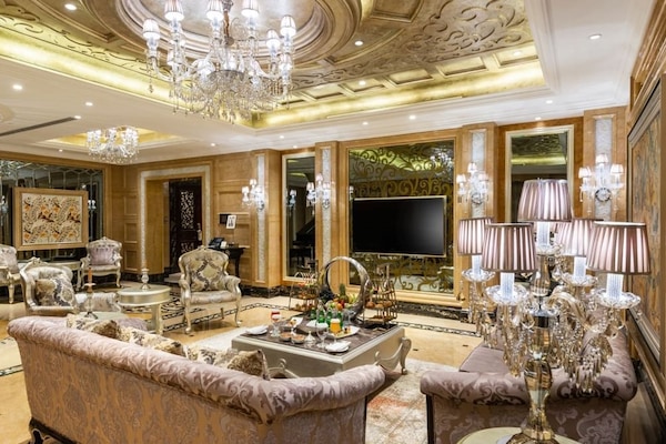 Royal Suite | Living room | 46-inch LED TV with satellite channels, TV