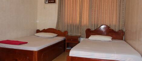 Pillow-top beds, desk, blackout curtains, free WiFi