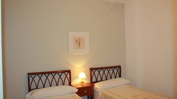 Pillow-top beds, desk, iron/ironing board, rollaway beds