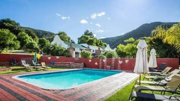 2 outdoor pools, pool umbrellas, sun loungers