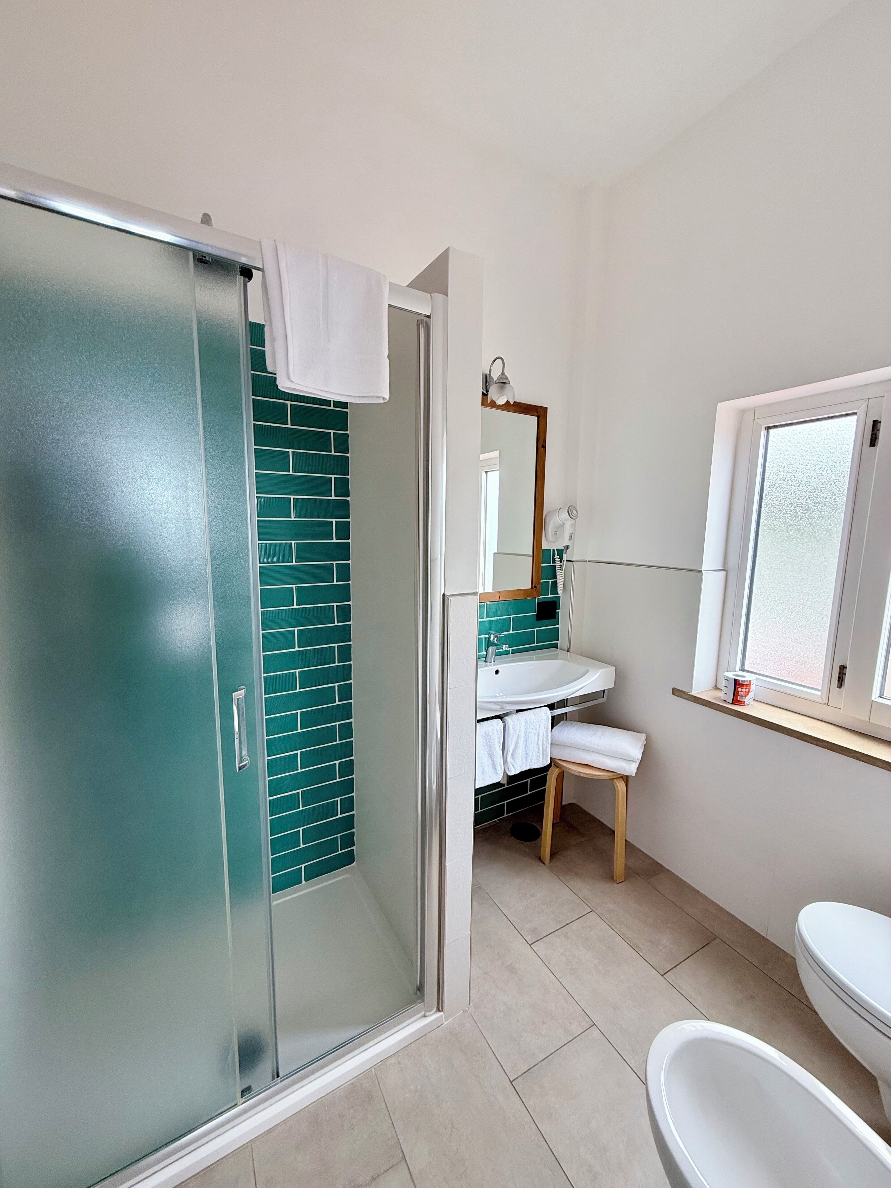 superior double or twin room, sea view | bathroom | rainfall showerhead, hair dryer, bidet, towels
