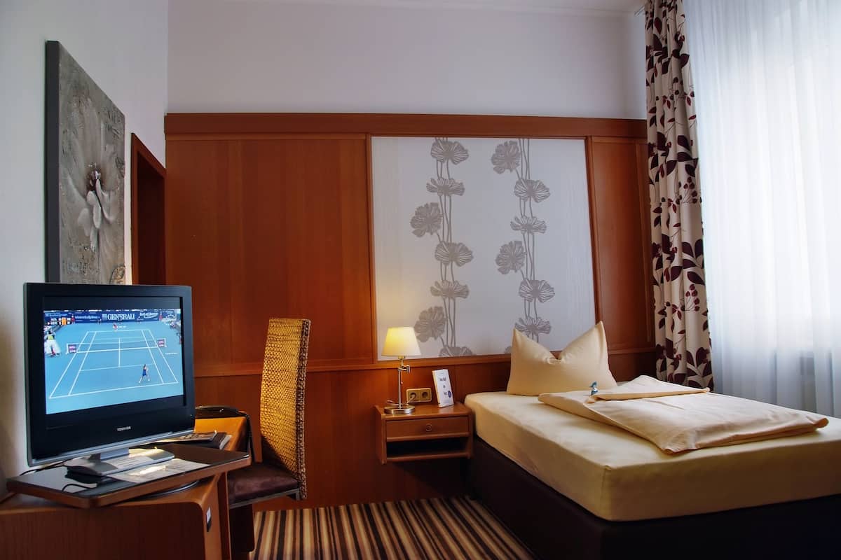 Hypoallergeen beddengoed, een minibar, een kluis op de kamer, een bureau