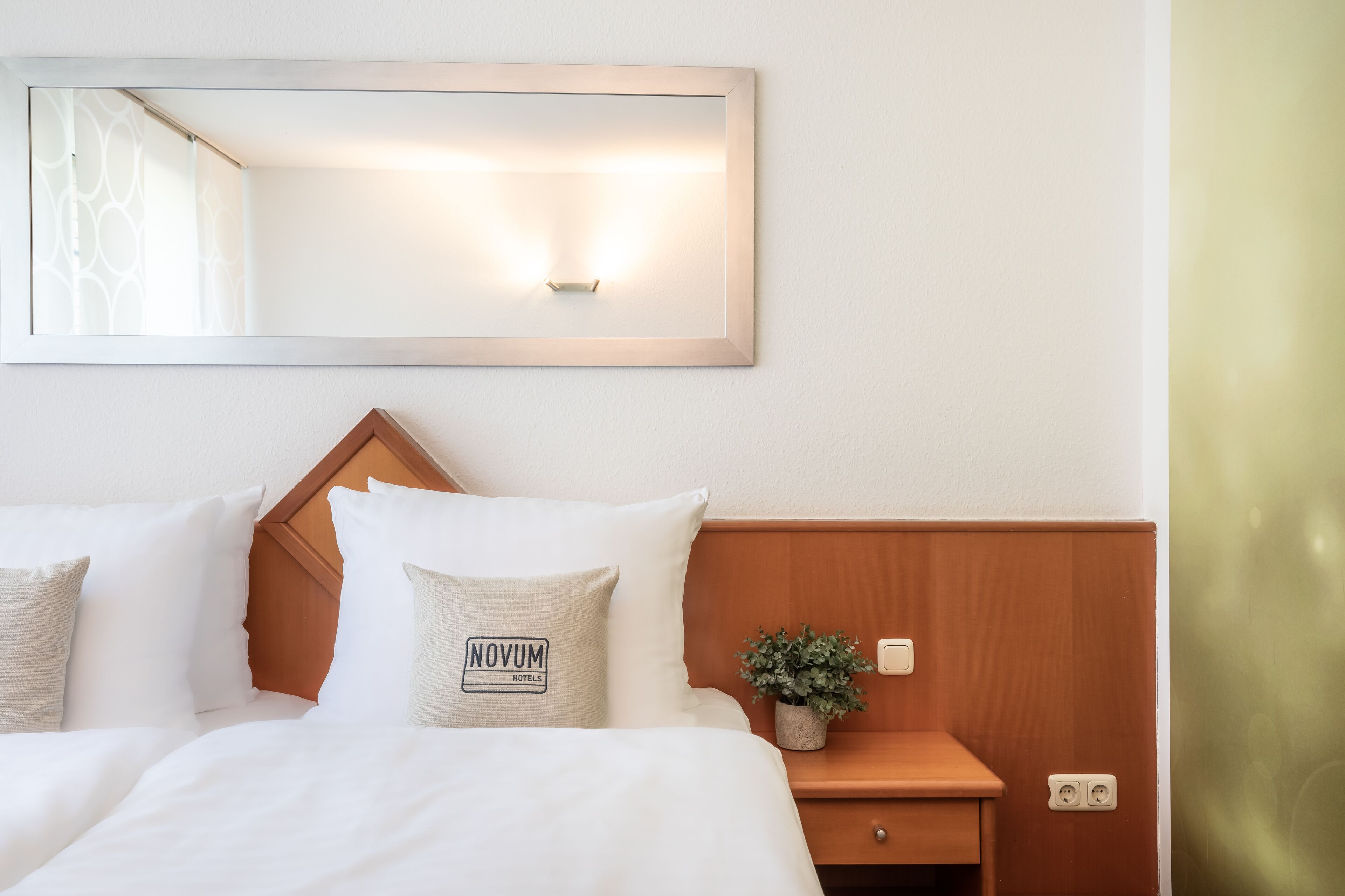 hypo-allergenic bedding, desk, blackout curtains, soundproofing