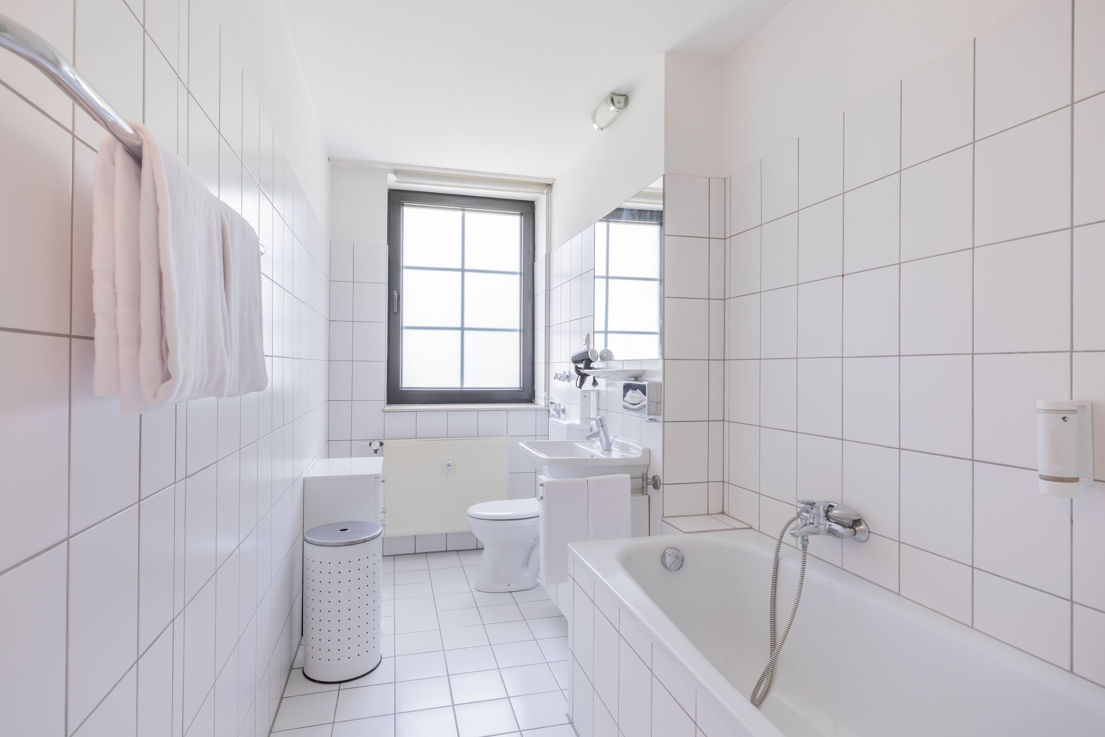 suite | bathroom | hair dryer, towels