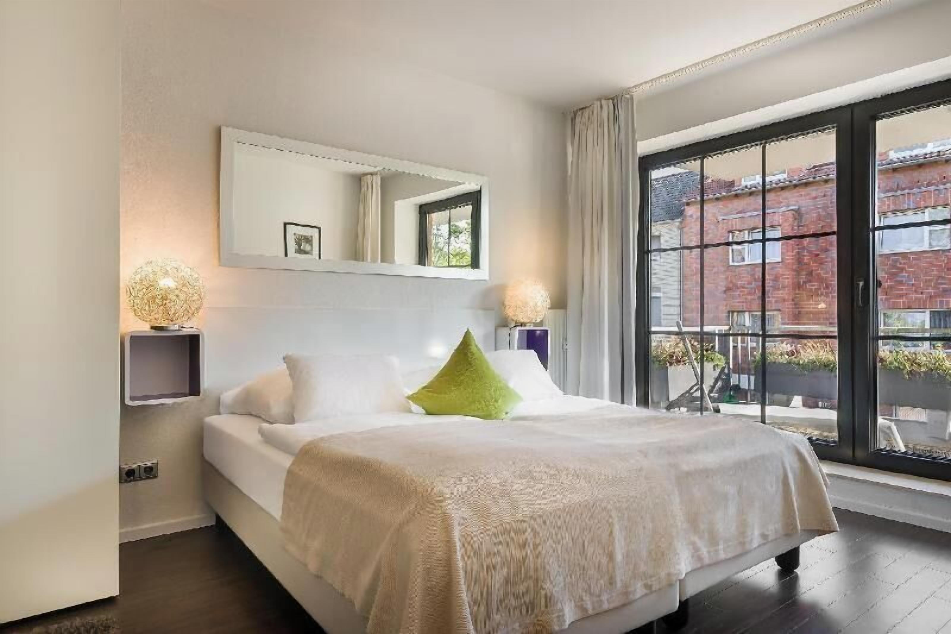 Hypo-allergenic bedding, desk, blackout drapes, soundproofing