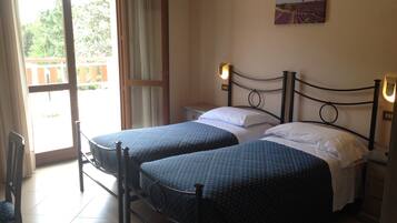 Chambre Deluxe avec lits jumeaux, 2 lits une place, non-fumeur, vue jardin