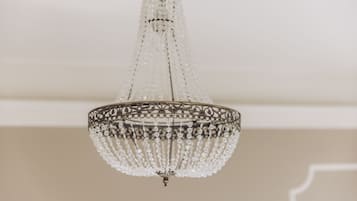 A chandelier with a metallic frame and crystal elements.