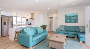 Tongariro & Ruapehu Luxury Villas | Living area | TV