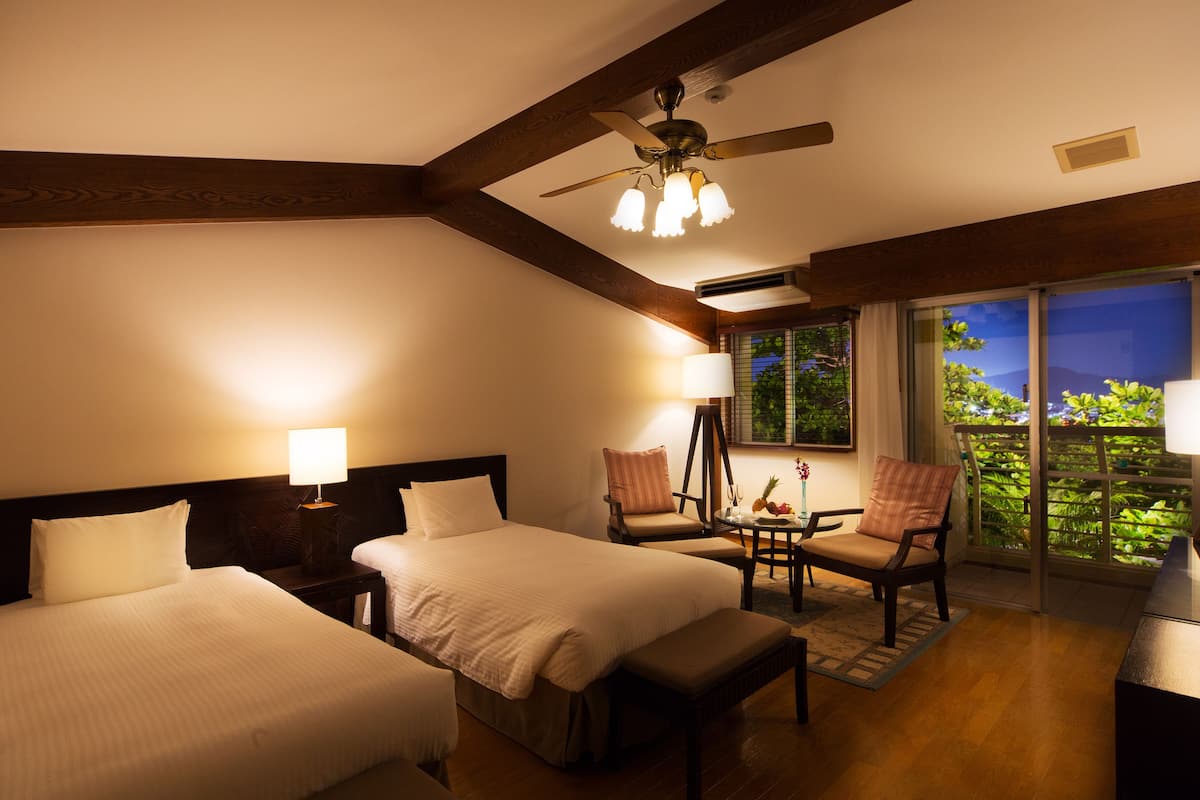 deluxe twin room garden view | premium bedding, down duvets, in-room safe, individually decorated