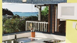 Chalet, Sea View | Private kitchen | Coffee/tea maker, fridge, microwave, stovetop - Bay Cabinz Motel (Paihia)