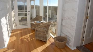 Sunrise Cottage - 1 Bedroom | Living area | Plasma TV, DVD player