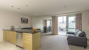 Superior Apartment, 2 Bedrooms | Living area | TV