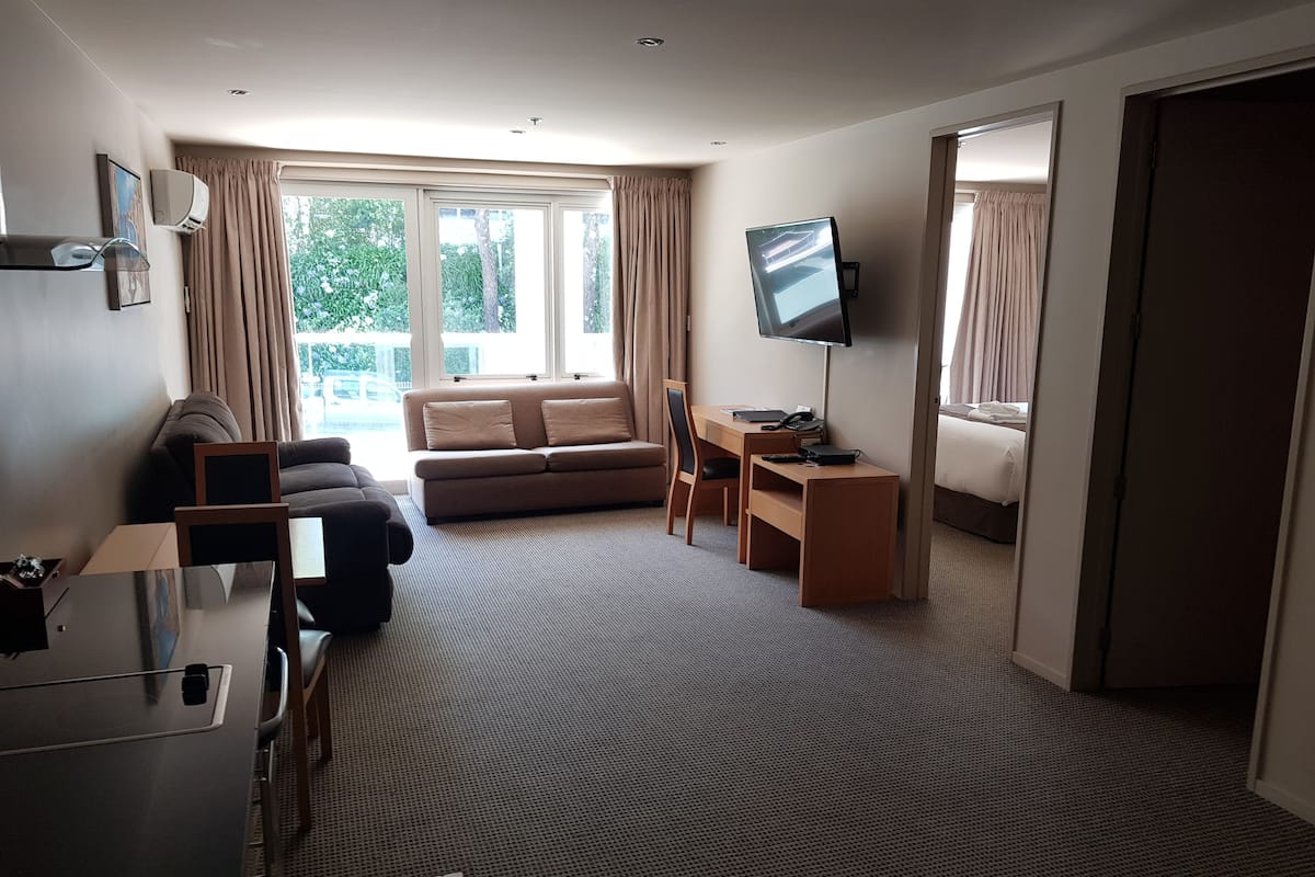 Executive Apartment, 3 Bedrooms | Living area | TV