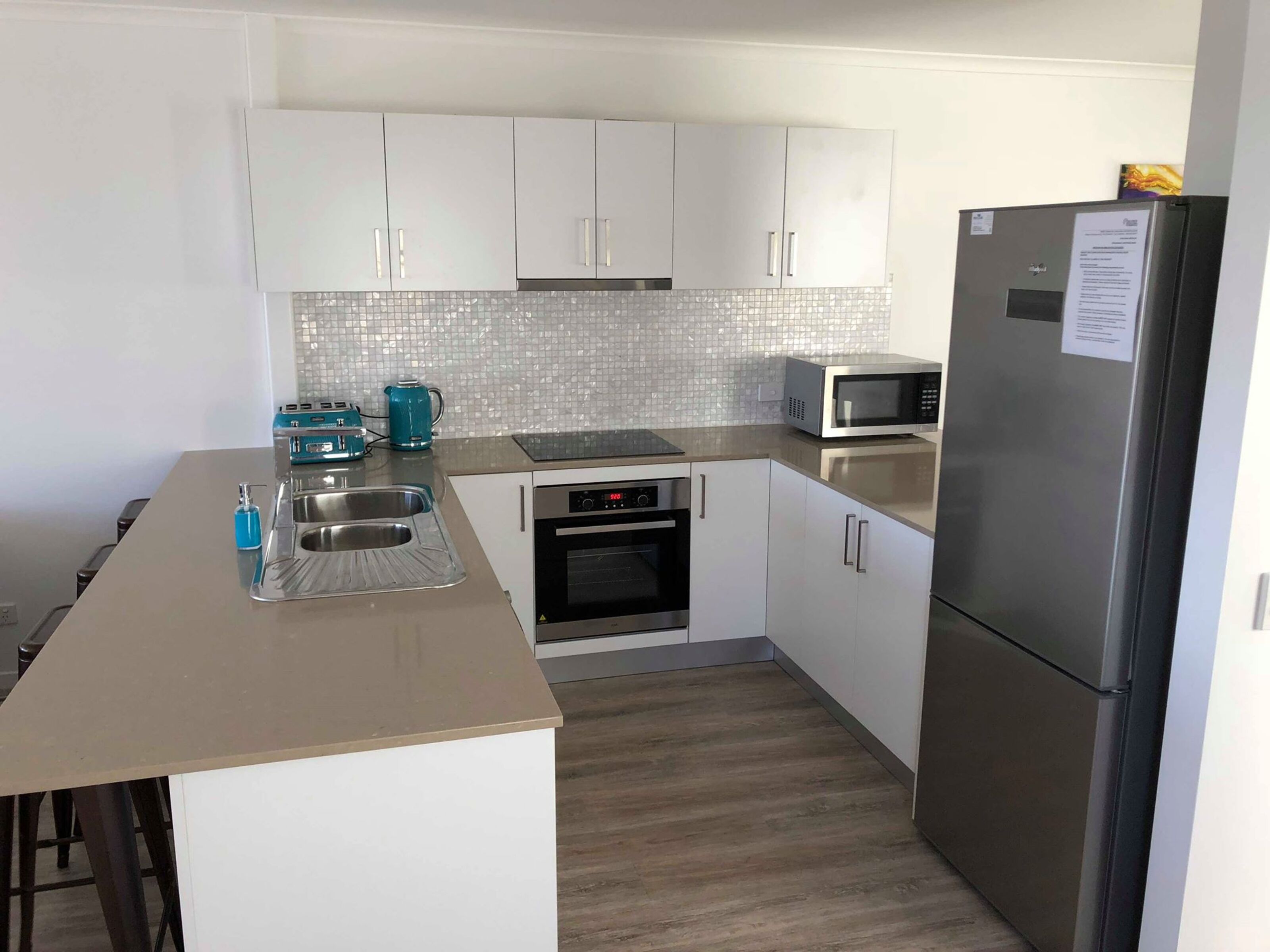 apartment, 2 bedrooms, ocean view | private kitchen | full-sized fridge, microwave, stovetop, dishwasher