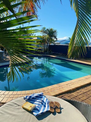 Outdoor pool, pool umbrellas, pool loungers